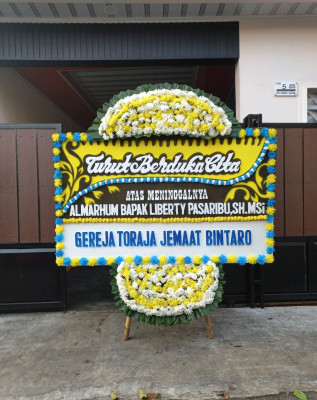 Papan Bunga Duka di Karyamukti